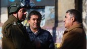 Rector del INBA fue agredido por encapuchados que luego incendiaron bus Red